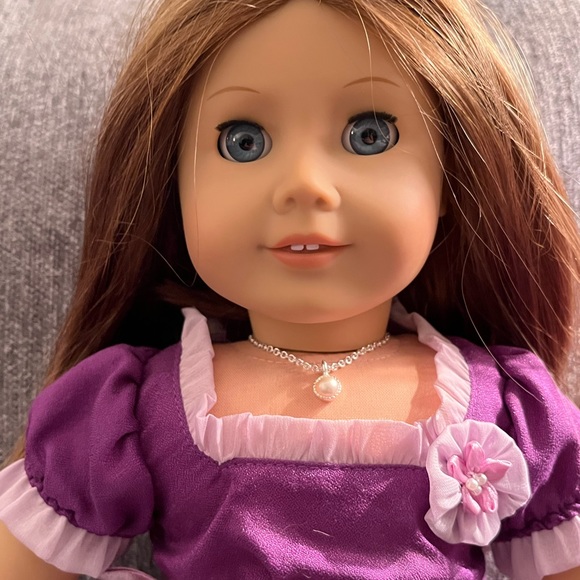 American Girl Doll Emily Bennett with dresses
